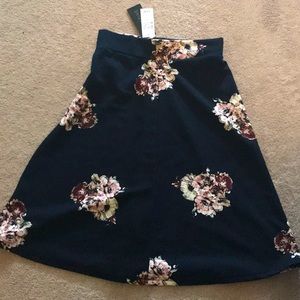 Magazine brand. Never worn. Tags still attached. Size Small.